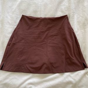 Girlfriend Collective Sport Skort in Earth, size M